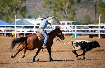Riders in a calf roping event at a country rodeo in Australia © Jackson Photography