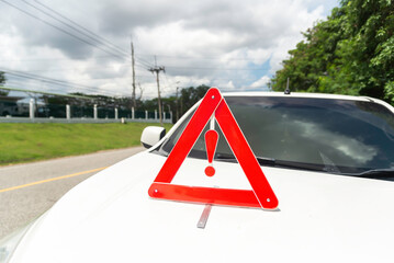 focus on the red triangle emergency stop sign