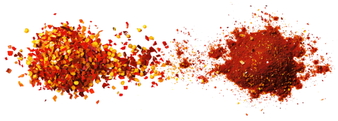 Crushed red cayenne pepper, dried chili flakes and ground minced paprika pile isolated on white, top view
