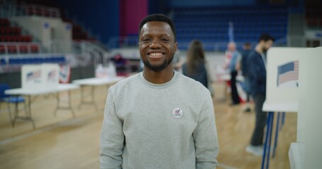 Happy US citizen after voting during Presidential Elections in the United States. Portrait of...