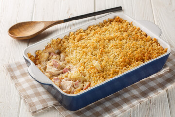 Chicken Cordon Bleu Casserole with chicken breast, chopped ham and Swiss cheese layered with creamy...
