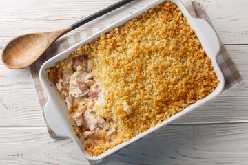 Chicken Cordon Bleu Casserole with chicken breast, chopped ham and Swiss cheese layered with creamy...
