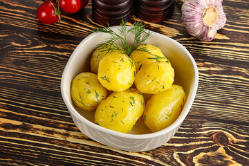 Boiled potato with oil and dill