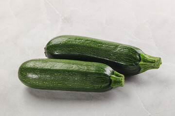 Raw green ripe zucchini vegetable