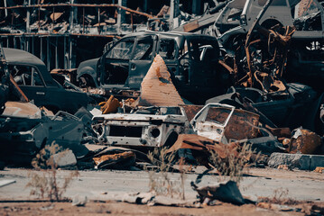 damaged and looted cars in a city in Ukraine during the war