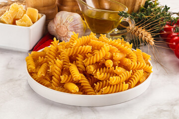 Italian dry pasta Fussili for bowl