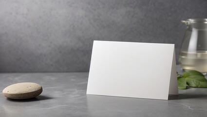 A blank sheet of white paper sits on a wooden table.