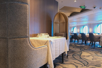 View inside elegant formal dining room or restaurant on board luxury cruiseship cruise ship ocean...