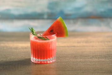 Summer drink, Glass of fresh watermelon juice on wooden table with copy space