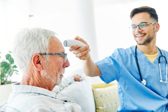 virus nurse doctor thermometer digital temperature medical senior man medicine disease care fever flu mask corona protection prevention