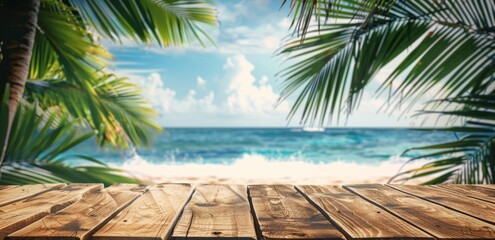 Photo of Wooden table on tropical beach with palm leaves and blue sea background