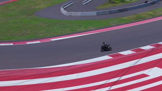 motorbikers compete speed race track drone video
