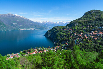 The Alps and Lake Como during a spring morning, near the village of Varenna, Italy - April 14, 2024