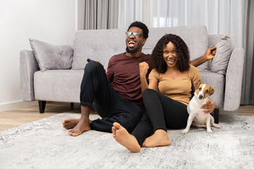 Happy Couple And Dog Celebrating At Home, Excitement, Lifestyle