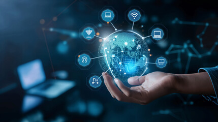 A hand holding an AI sphere with digital icons and data flowing through it, set against the backdrop of office equipment such as laptops and computers, representing modern business technology