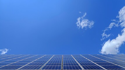 Wideangle view of a home s rooftop covered in solar panels, with a brilliant blue sky enhancing the image s focus on energy efficiency