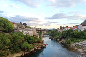Fototapeta na wymiar Neretva River and bridge in Mostar, Bosnia and Herzegovina at daytime in spring