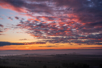 red clouds over the rhine valley at sunrise