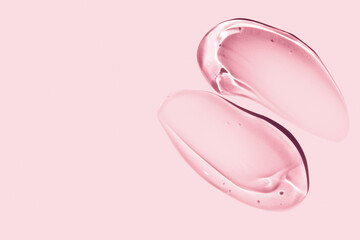 composition of smears of cosmetic pink gel on a pink background - obrazy, fototapety, plakaty