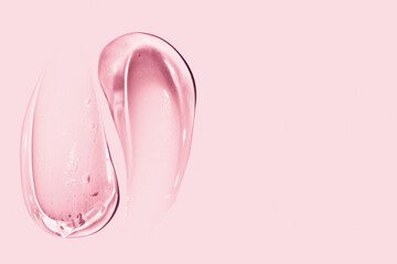 composition of smears of cosmetic pink gel on a pink background