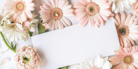 White sheet of paper in a frame of flowers
