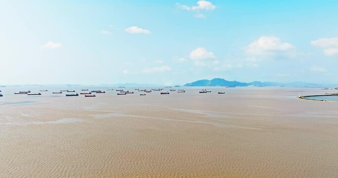 Aerial view of beautiful coastline natural landscape in Zhoushan, China. Drone ascending to shoot.