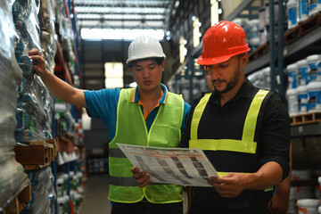Portrait of Caucasian male Professional engineer wearing a uniform and safety quality control, maintenance, checking in a factory, warehouse Workshop for factory operators