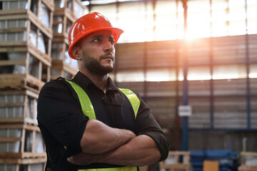 Portrait of Confident Caucasian male warehouse engineer, supervisor or manager in arm crossed