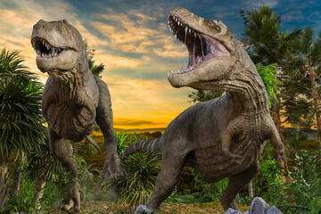 Obraz na płótnie Canvas 2匹のティラノサウルスが大きな口を開け獲物を探す