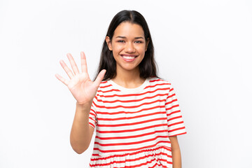 Young Colombian woman isolated on white background counting five with fingers