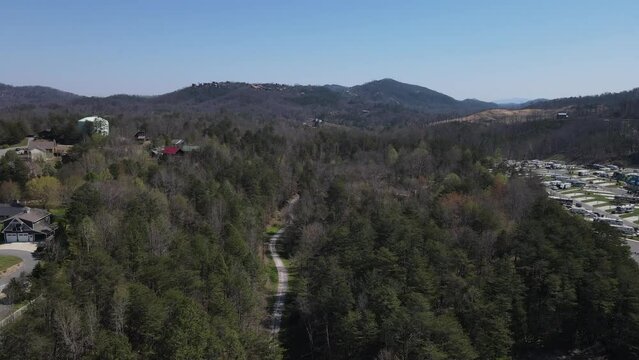 Forested road in rapidly developing area in Pigeon Forge
