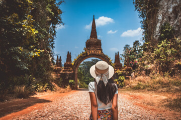 Traveler asian woman relax and travel in temple at Khao Na Nai Luang Dharma Park Surat Thani...