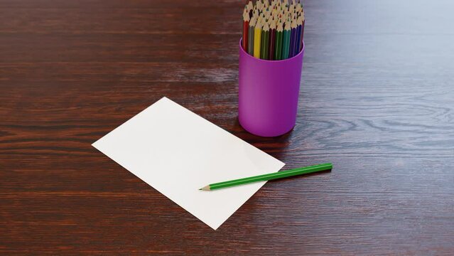 Colored pencils and a blank piece of paper before creating a drawing.
