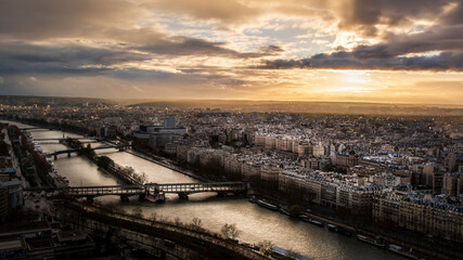 View over the river seine at sunset. Wide angle landscape photo of the city of Paris