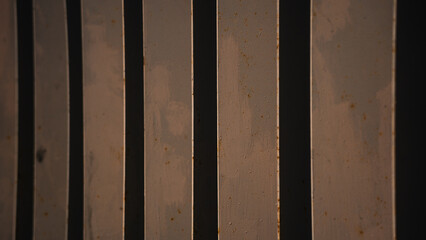 rhythm, vertical steel orange fence