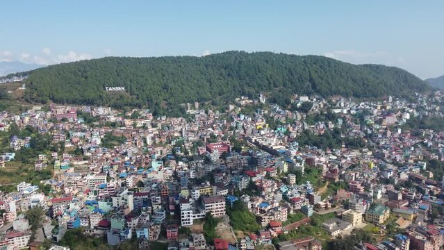 Aerial footage of the cityscape of Tansen on a sunny day in Palpa city in Lumbini in central Nepal
