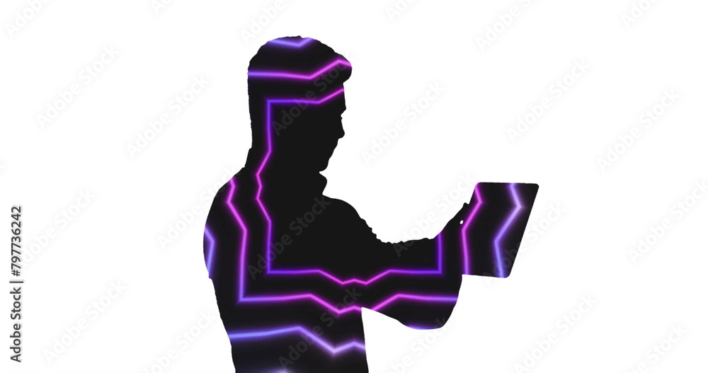 Poster Image of illuminated abstract shape pattern in thoughtful shadow of man using digital tablet