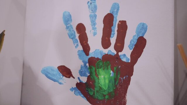 Colorful family handprint painting, a personal touch of home art