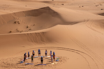 person in the dunes The most beautiful safaris in the desert _ Moroccan desert _ camel riding in...