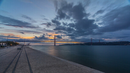 Lisbon city sunrise with April 25 bridge timelapse