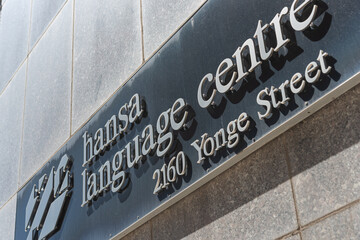 Fototapeta premium exterior building and sign of Hansa Language Centre located at 2160 Yonge Street in Toronto, Canada