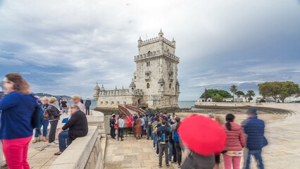 Belem Tower is a fortified tower located in Belem timelapse hyperlapse in Lisbon, Portugal - obrazy, fototapety, plakaty