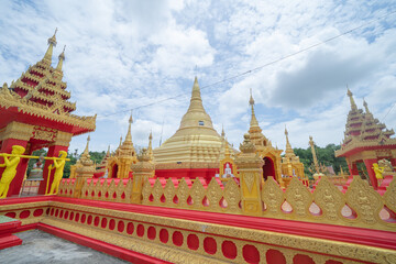 Fototapeta premium The Isan pagoda is a buddhist temple near Bangkok, an urban city town, Thailand. Thai architecture landscape background. Tourist attraction landmark.