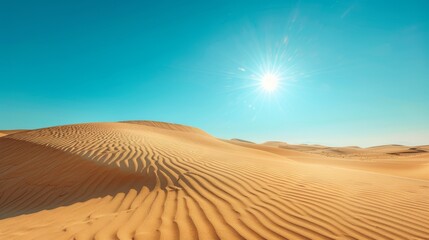 Majestic desert dunes under a clear blue sky: the beauty of arid landscapes.