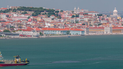 Panorama of Lisbon historical centre aerial timelapse viewed from above the southern margin of the...