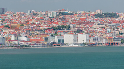 Panorama of Lisbon historical centre aerial timelapse viewed from above the southern margin of the...