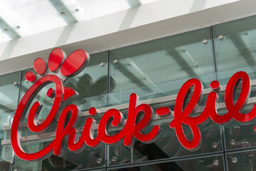 Naklejka premium close-up sign of Chick-fil-A, a conservative American fast food restaurant chain, located at 709 Yonge Street (One Bloor East) in downtown Toronto, Canada