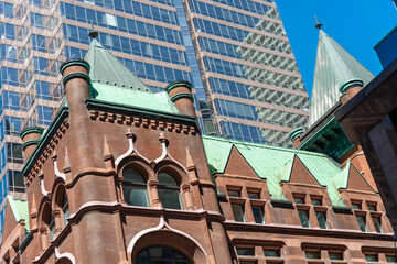 Naklejka premium roofline of heritage property (originally Confederation Life Building 1889) located at north east corner of Richmond Street East and Yonge Street in downtown Toronto, Canada