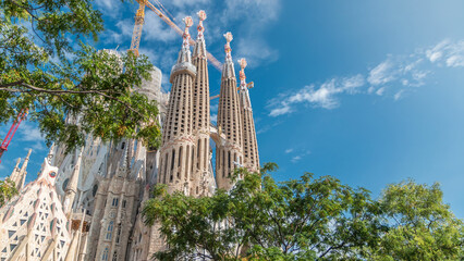 Sagrada Familia, a large Roman Catholic church in Barcelona, Spain timelapse - obrazy, fototapety, plakaty