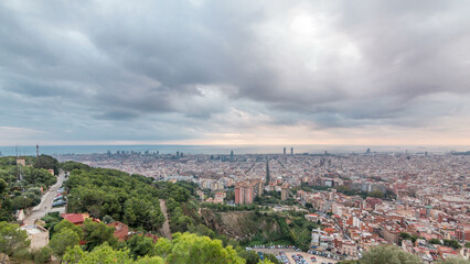 Fototapeta na wymiar Panorama of Barcelona timelapse, Spain, viewed from the Bunkers of Carmel